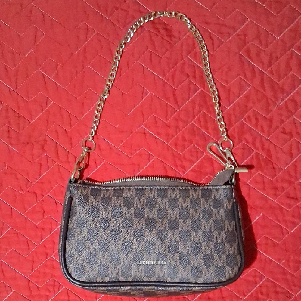 Chain Pochette Shoulder Bag.